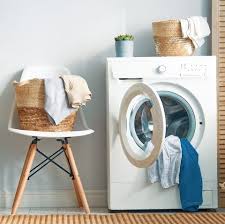 washing machine full of dirty laundry